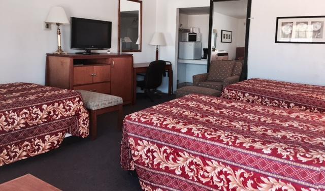 Maple Inn And Suites לוס באנוס מראה חיצוני תמונה
